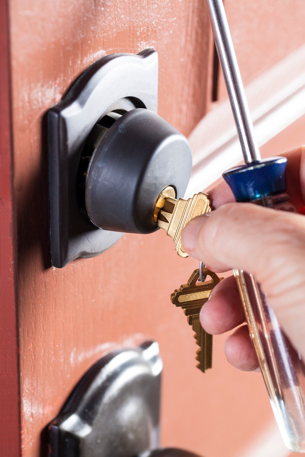 Locksmith trying to open the door lock